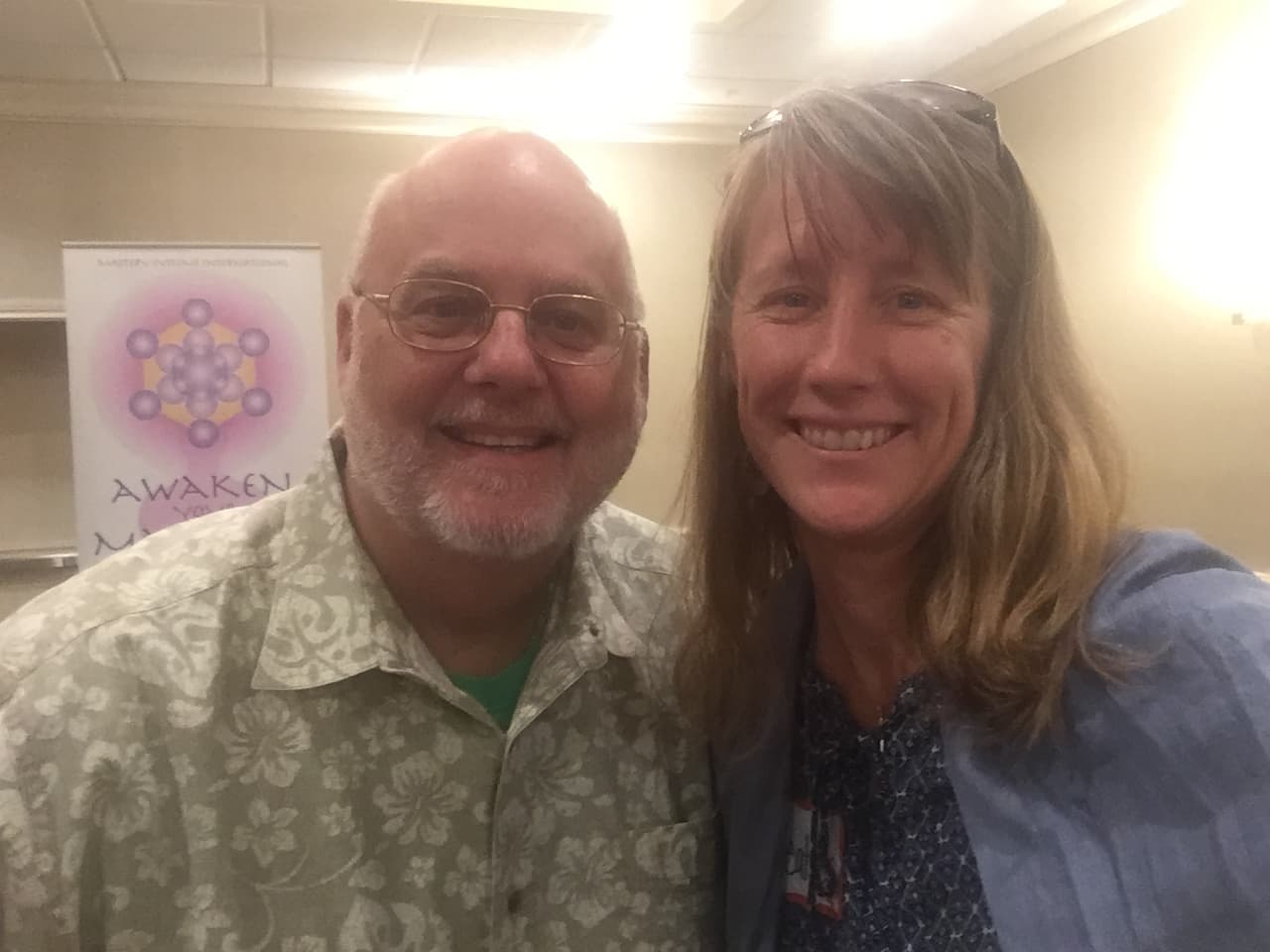 Heather and Bob smiling together in a candid photograph