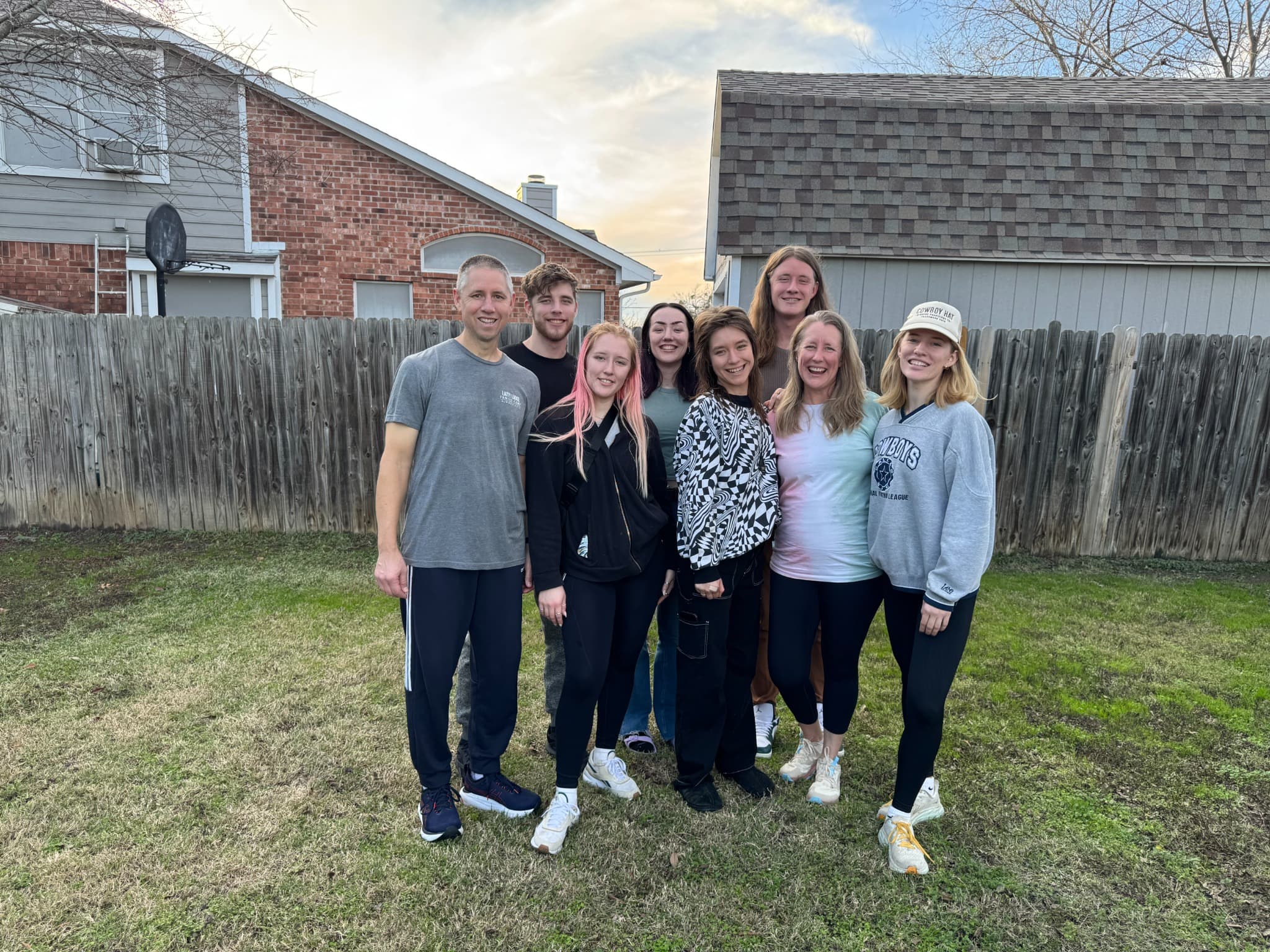 Heather and her family gathered together in their backyard